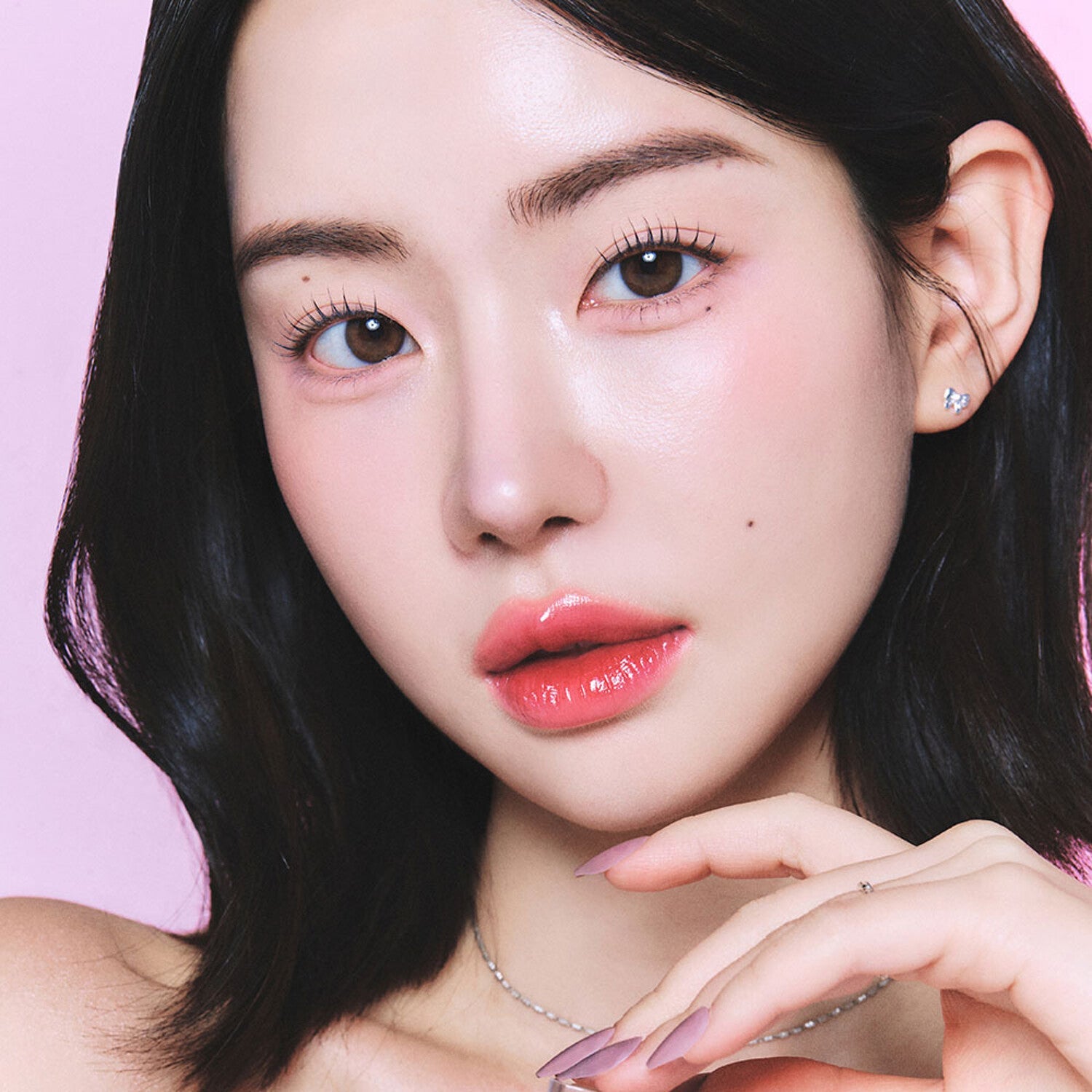 BANILA CO Dew Glow Tint 3.8g: A lightweight lip tint that provides a luminous glow and long-lasting color.