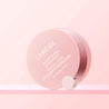 The treatment has a bouncy texture that glides smoothly and absorbs quickly, making it ideal for daily use or as an overnight lip mask. Its compact size is perfect for on-the-go lip care.